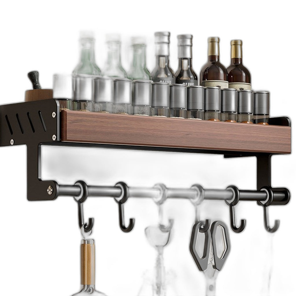 Walnut wall shelf with hooks by Glow Ritual