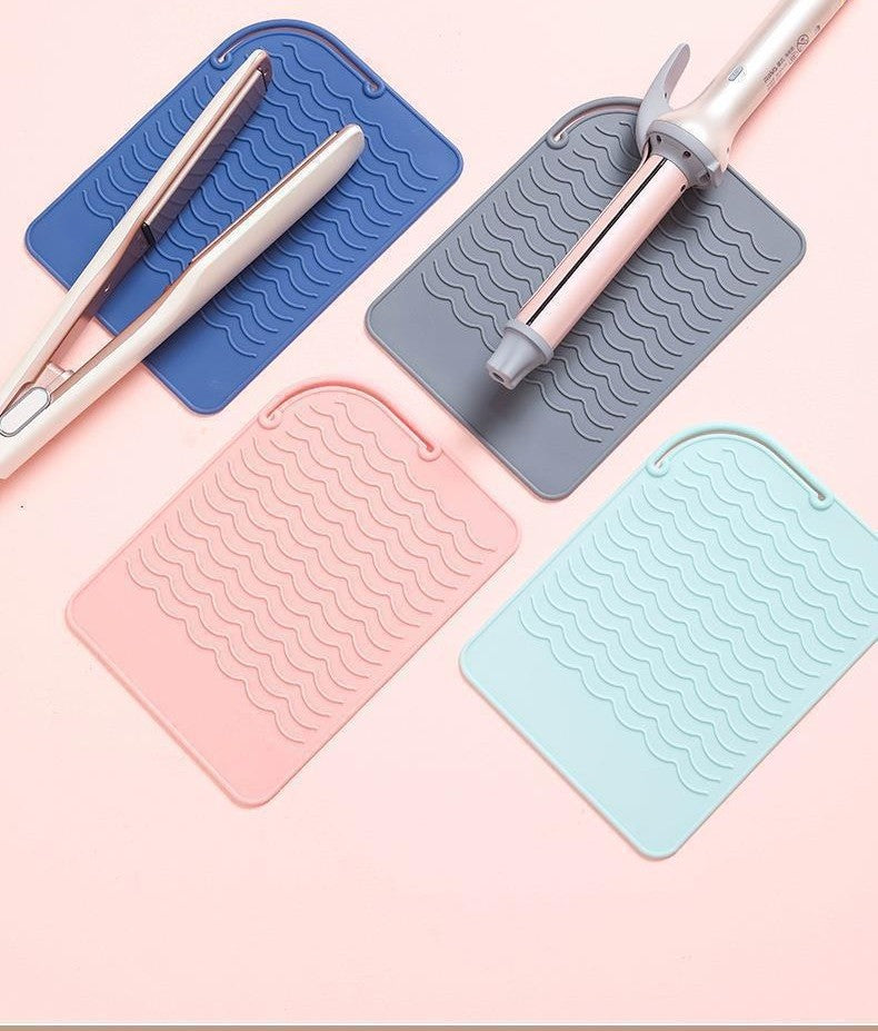 Silicone heat-resistant styling mat by Glow Ritual