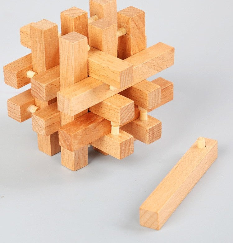 Wooden brain teaser puzzle set by Glow Ritual