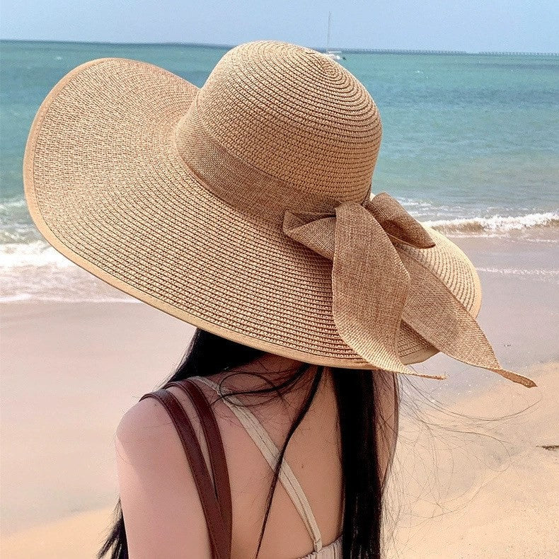 Wide brim straw sun hat by Glow Ritual