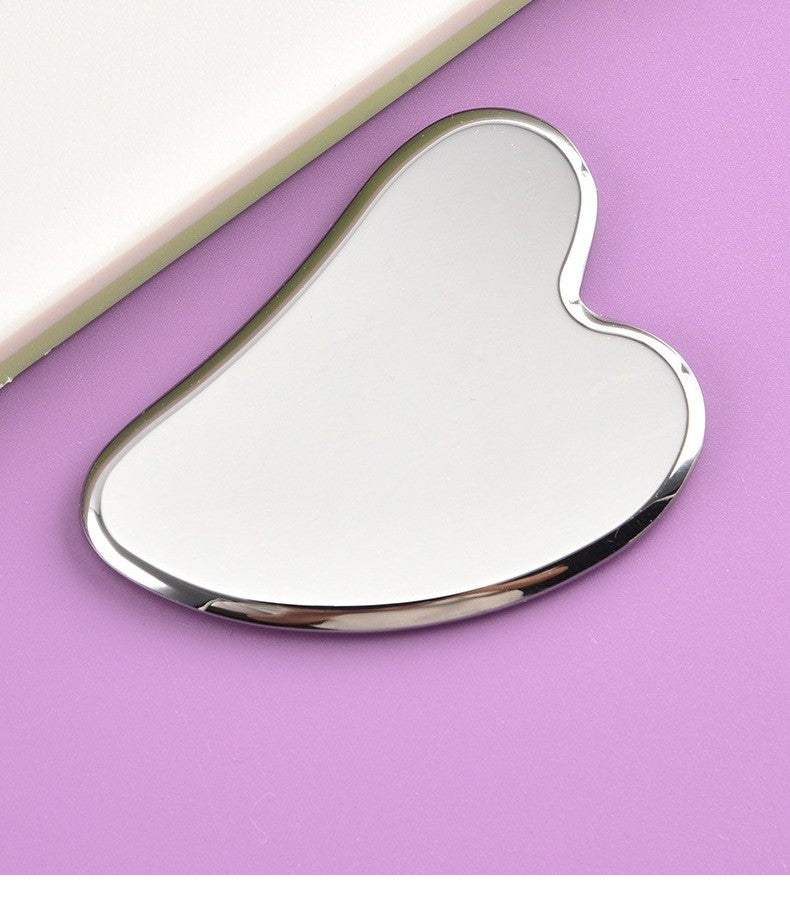 Stainless steel gua sha tool by Glow Ritual