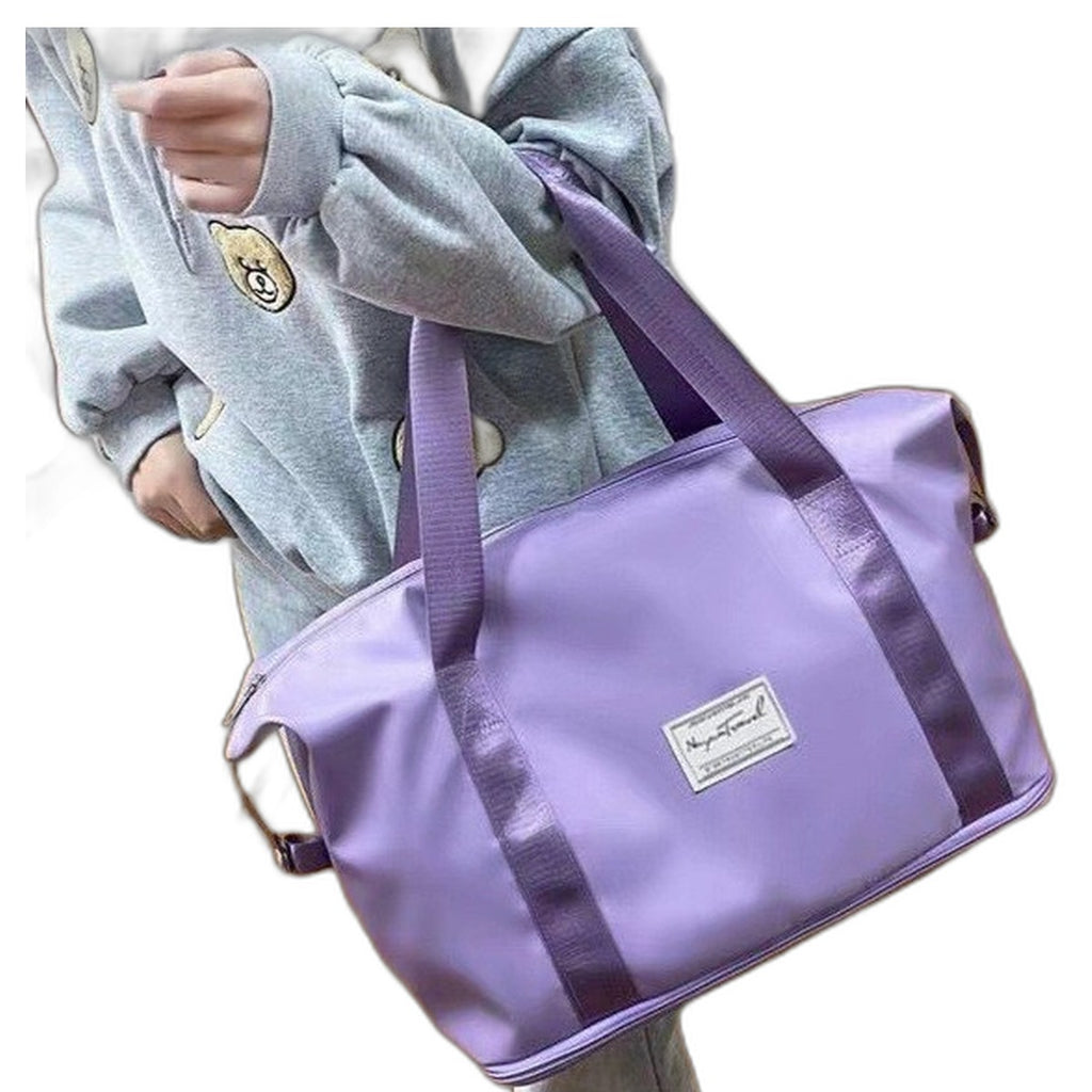 Foldable travel duffel bag by Glow Ritual