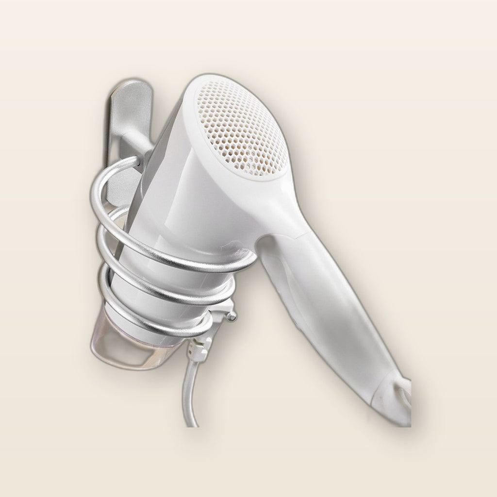 Wall-mounted hair dryer holder by Glow Ritual