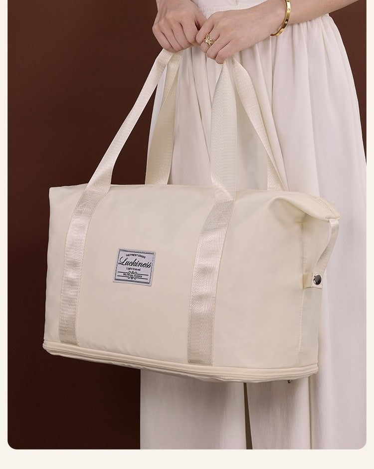Foldable travel duffel bag by Glow Ritual
