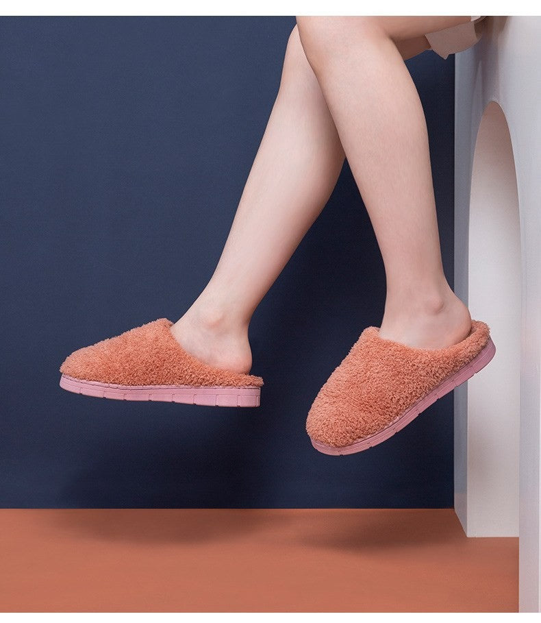 Fuzzy plush house slippers by Glow Ritual