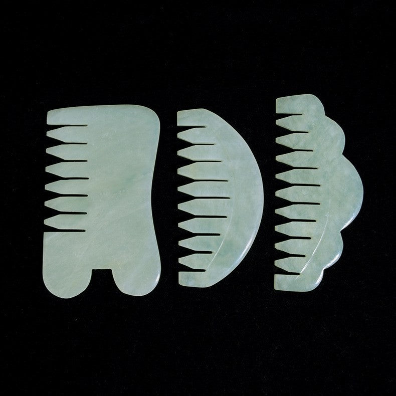 Natural jade gua sha comb by Glow Ritual