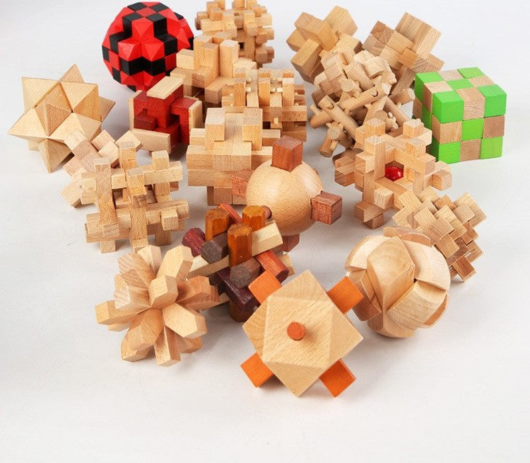 Wooden brain teaser puzzle set by Glow Ritual