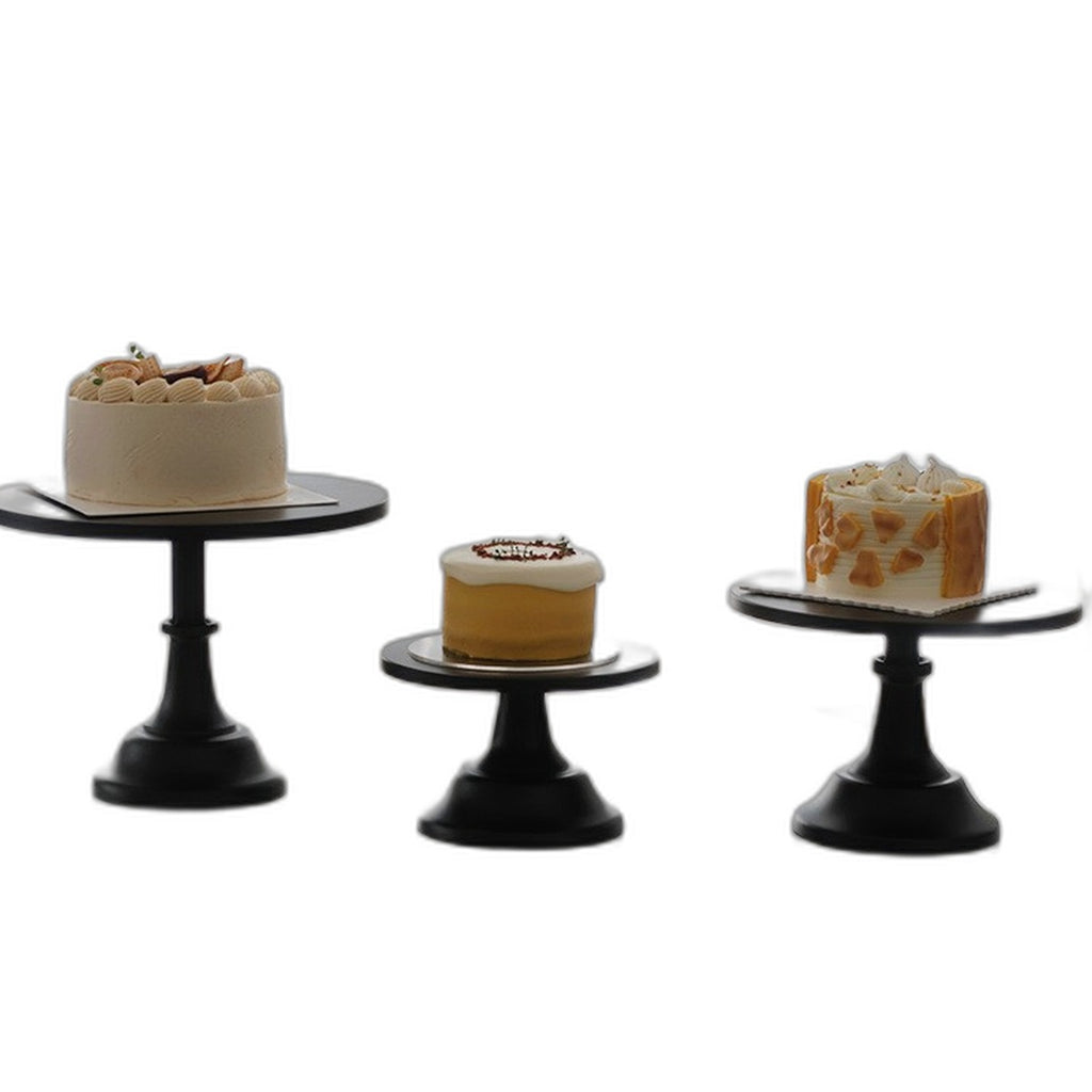 Metal cake stand by Glow Ritual