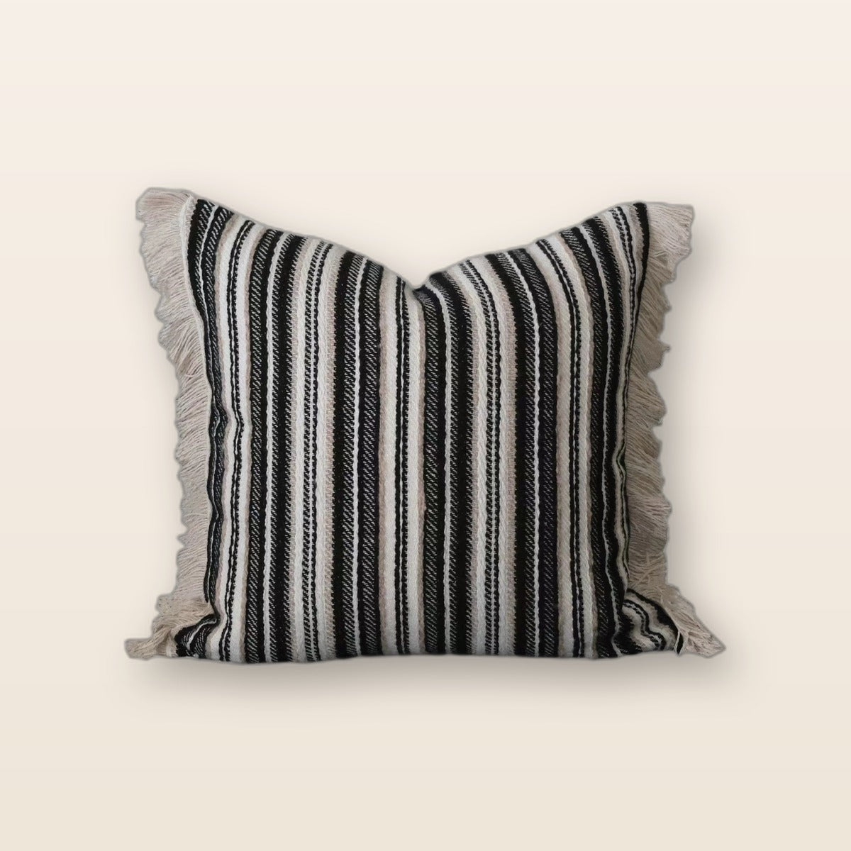 Knit tassel throw pillow by Glow Ritual