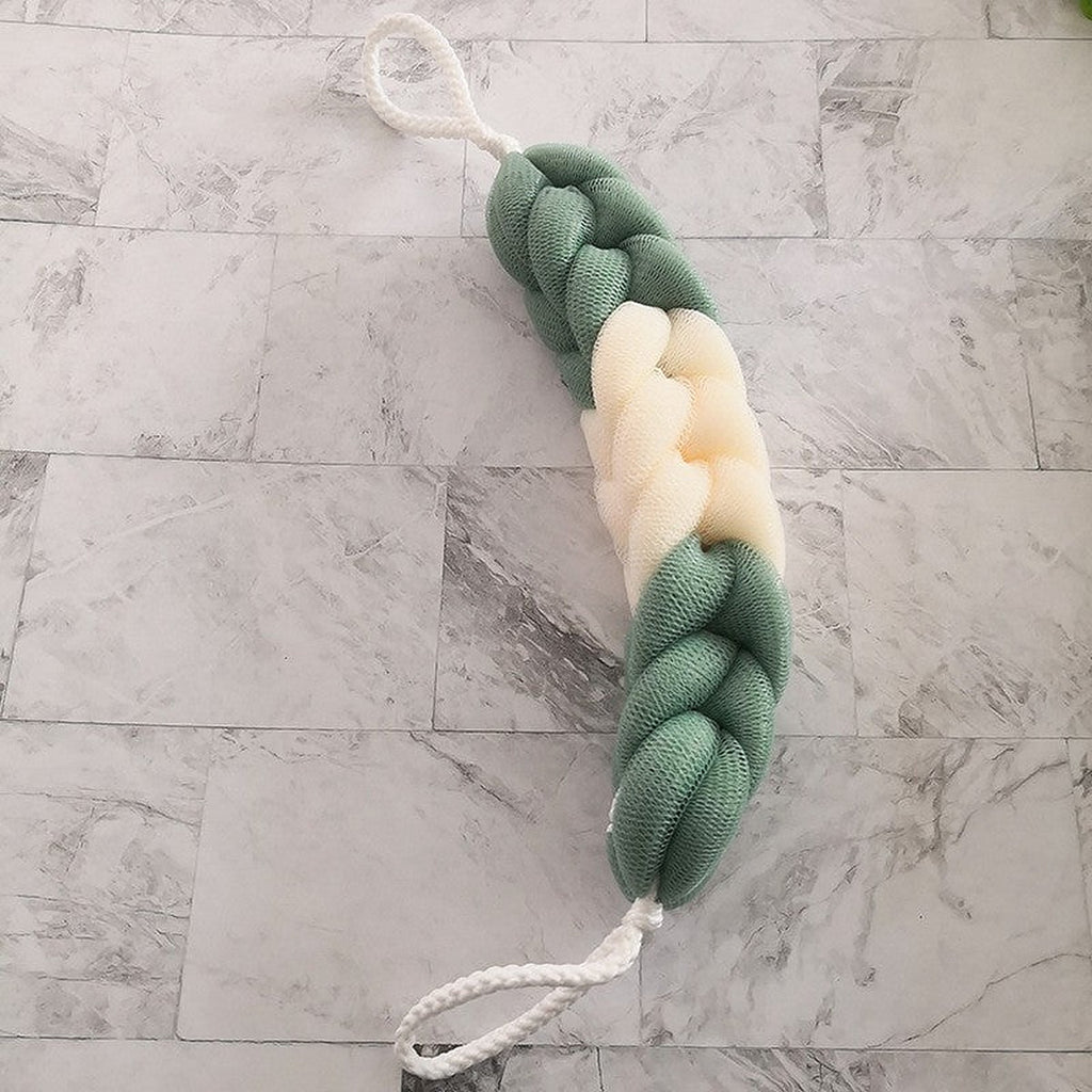 Exfoliating back scrubber strap by Glow Ritual