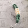 Exfoliating back scrubber strap by Glow Ritual