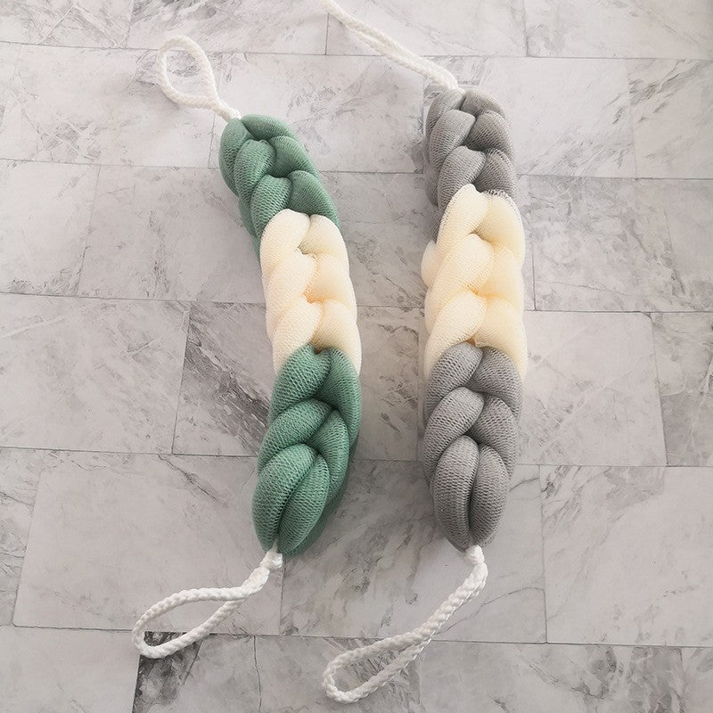 Exfoliating back scrubber strap by Glow Ritual