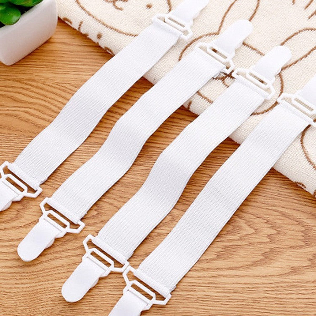 Bed sheet suspenders by Glow Ritual
