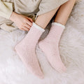 Fluffy bed socks by Glow Ritual