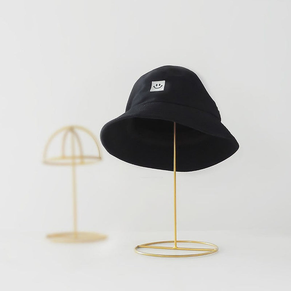 Metal hat stand by Glow Ritual