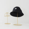 Metal hat stand by Glow Ritual