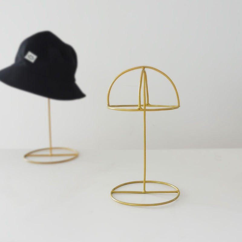 Metal hat stand by Glow Ritual