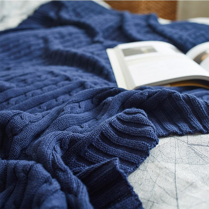 Cable knit throw blanket by Glow Ritual