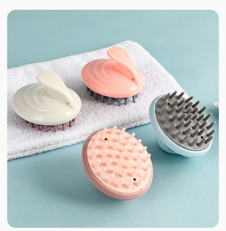 Silicone scalp scrubber shampoo brush by Glow Ritual