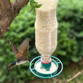 Bottle-top bird feeder by Glow Ritual