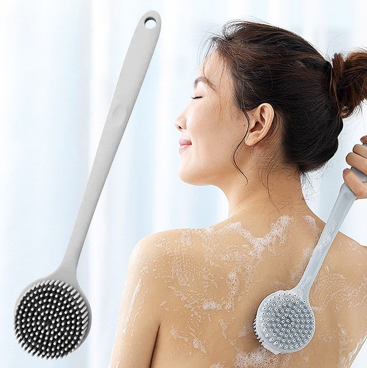 Silicone body scrubber by Glow Ritual