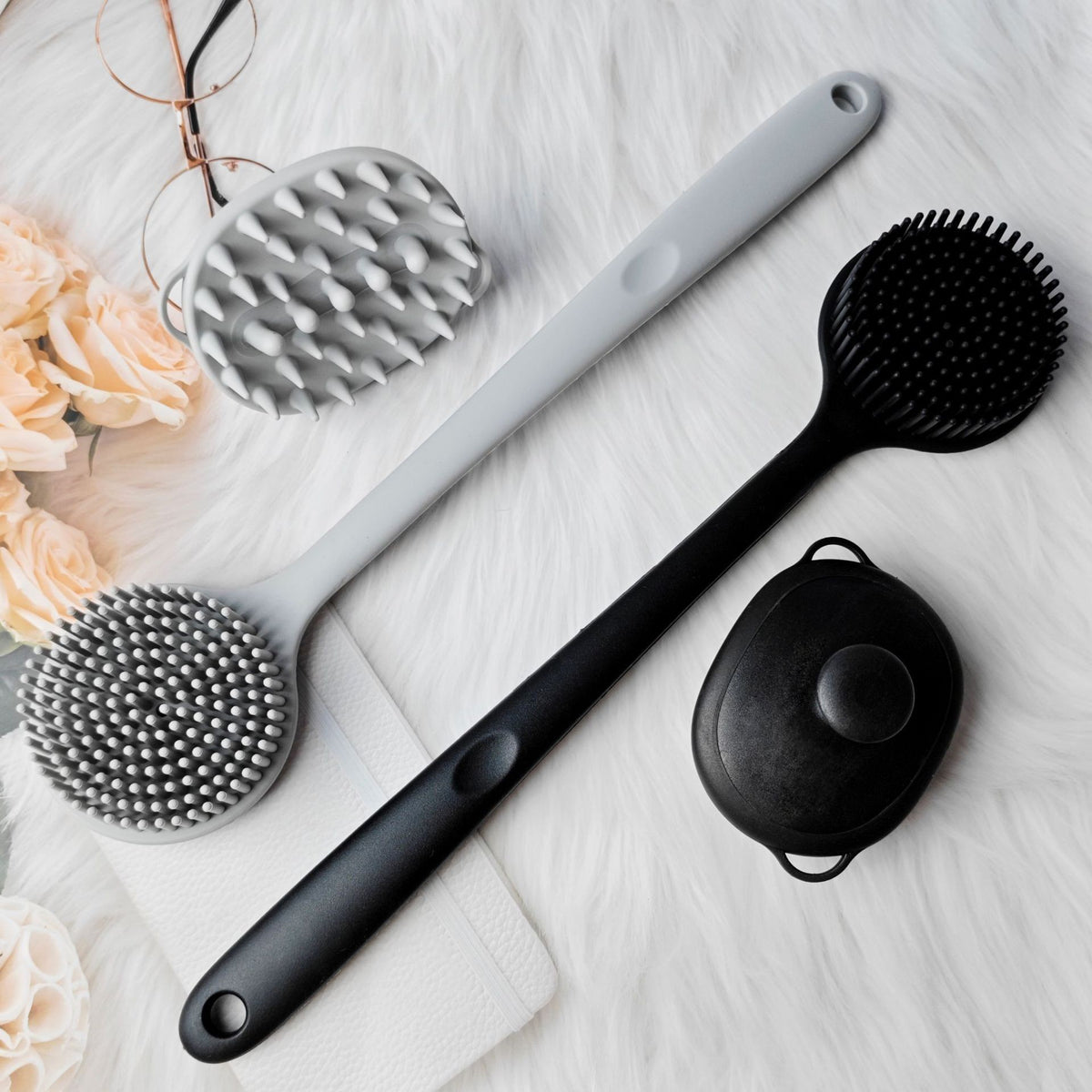 Silicone body scrubber by Glow Ritual