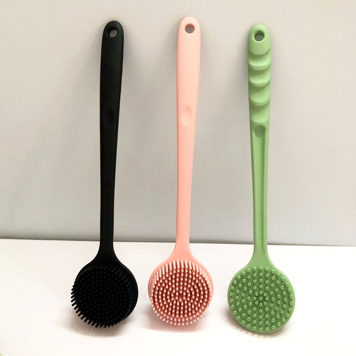 Silicone body scrubber by Glow Ritual