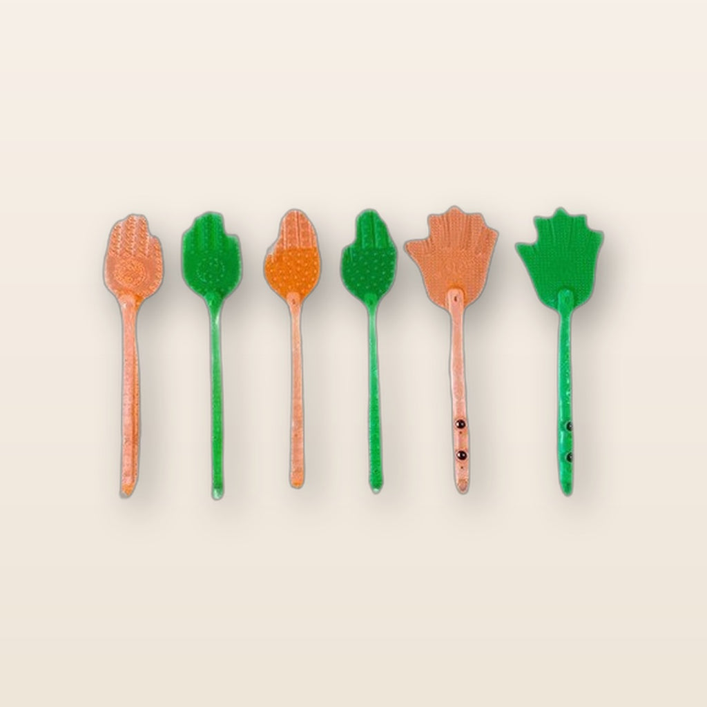 Silicone pat massage paddle by Glow Ritual
