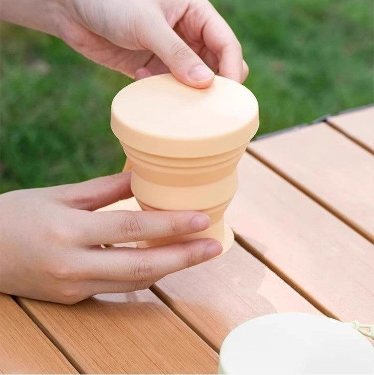 Collapsible silicone travel cup by Glow Ritual
