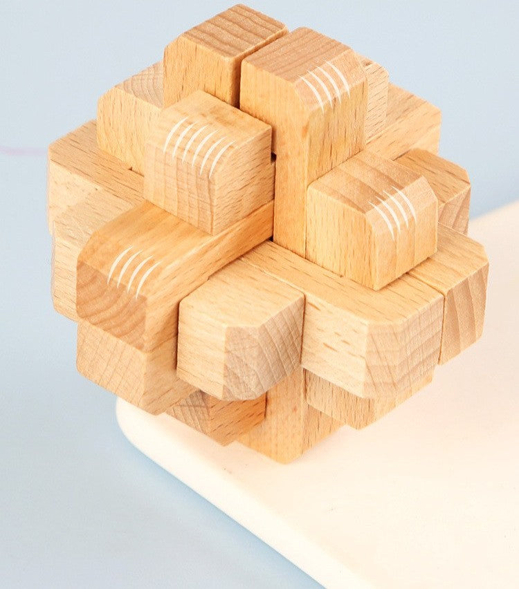 Wooden brain teaser puzzle set by Glow Ritual