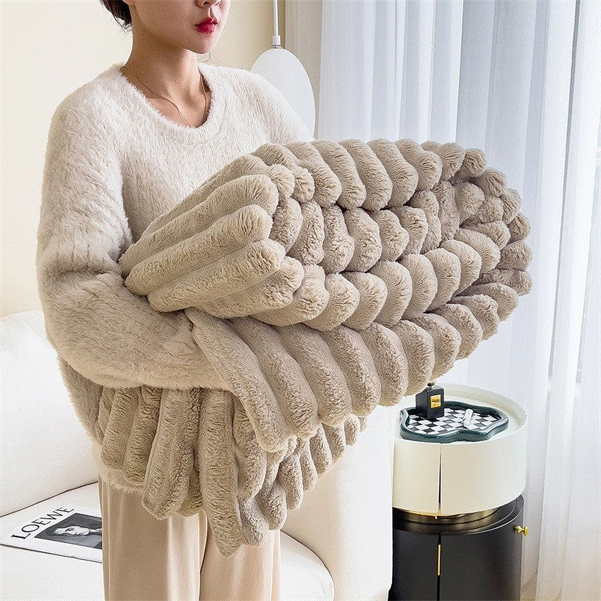 Faux rabbit fleece blanket by Glow Ritual