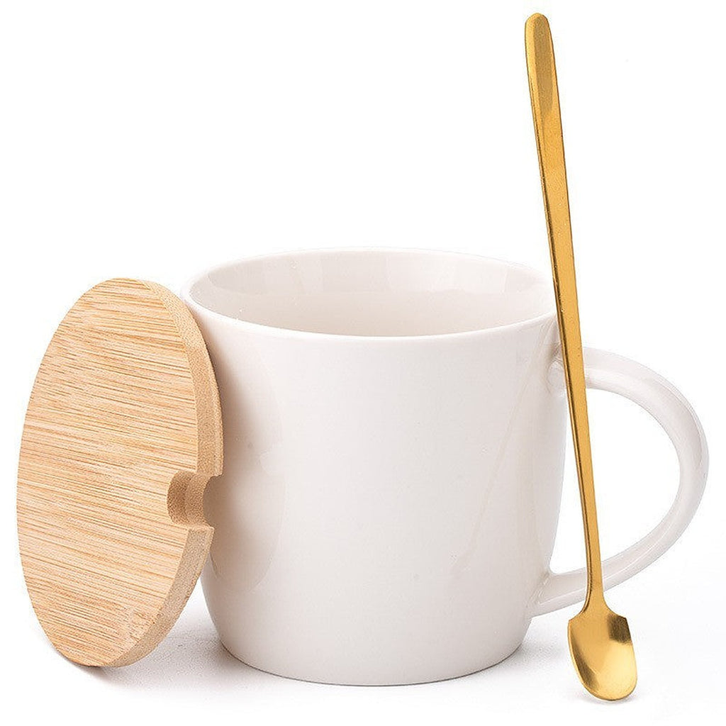White ceramic mug with lid and spoon by Glow Ritual