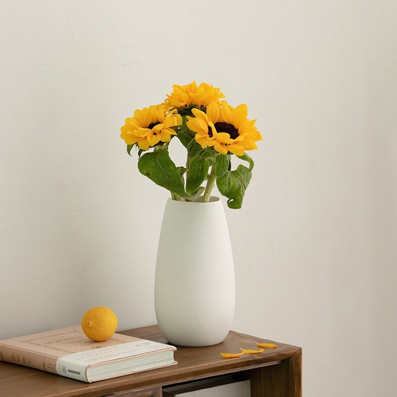 White ceramic vase by Glow Ritual