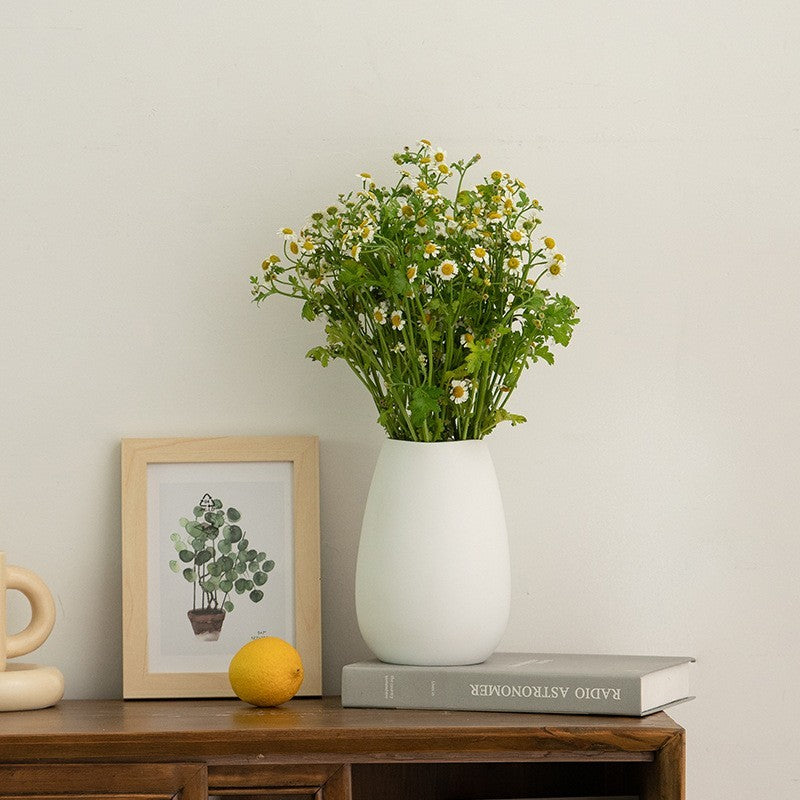 White ceramic vase by Glow Ritual