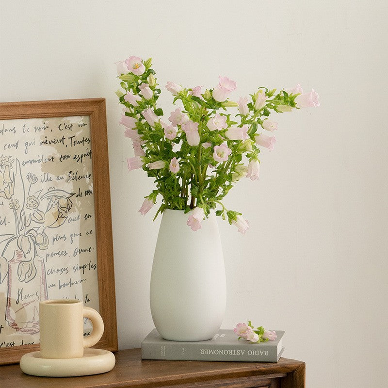 White ceramic vase by Glow Ritual