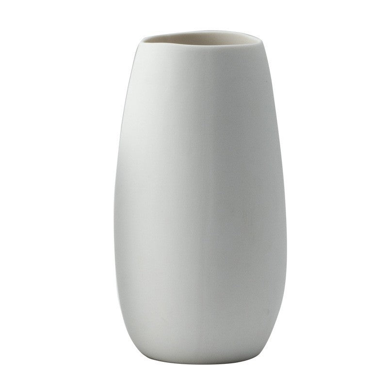White ceramic vase by Glow Ritual