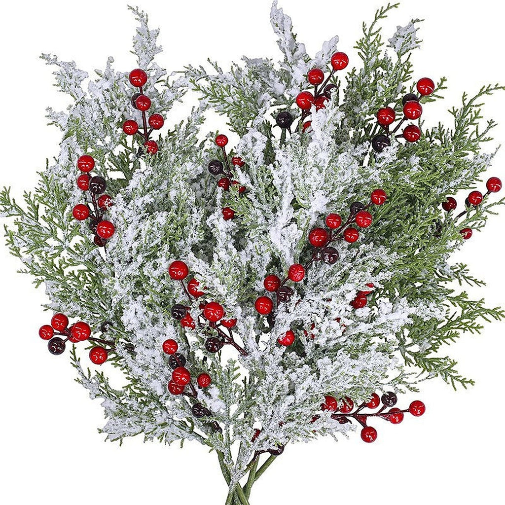 Artificial cedar and red berry picks by Glow Ritual