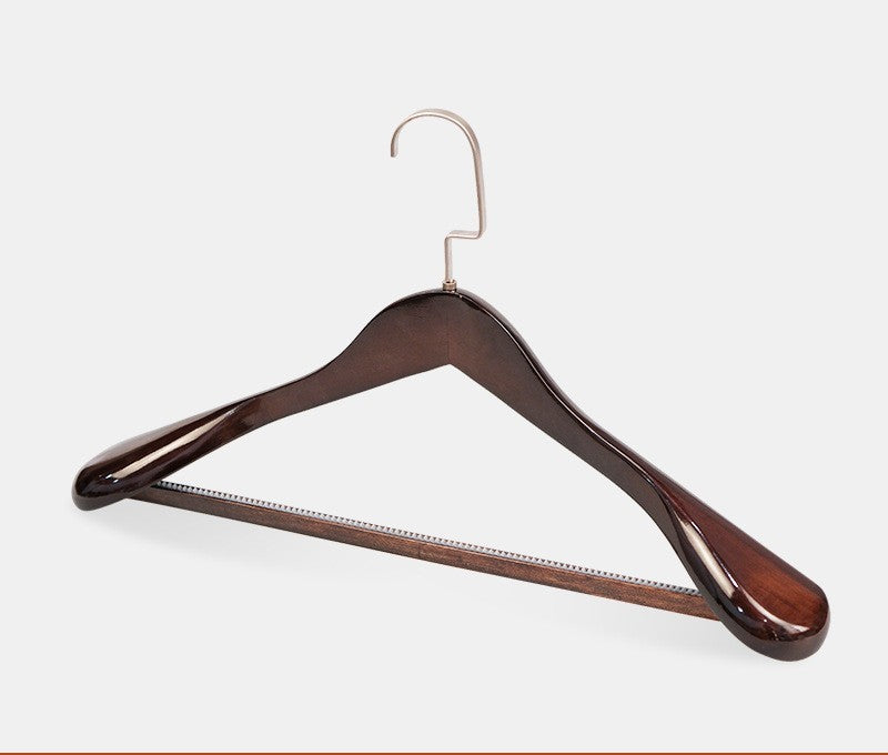 Wide shoulder wooden coat hangers by Glow Ritual