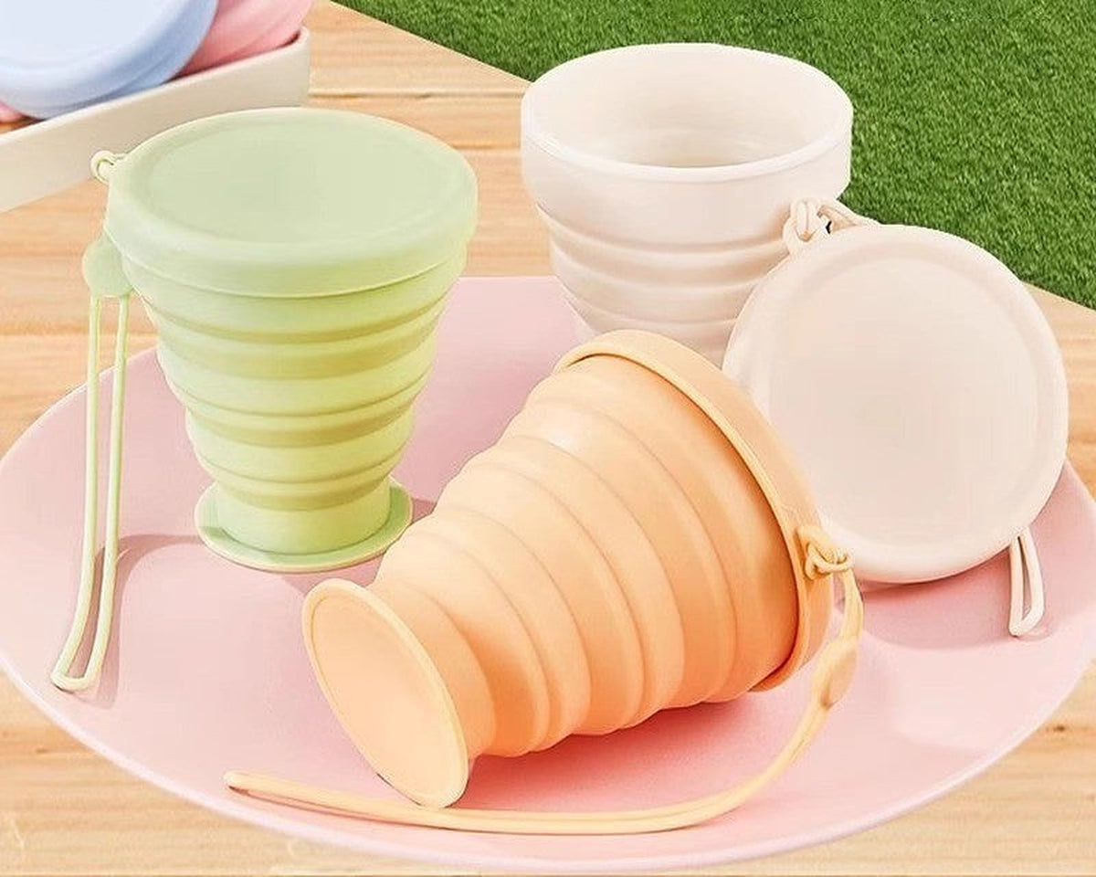 Collapsible silicone travel cup by Glow Ritual