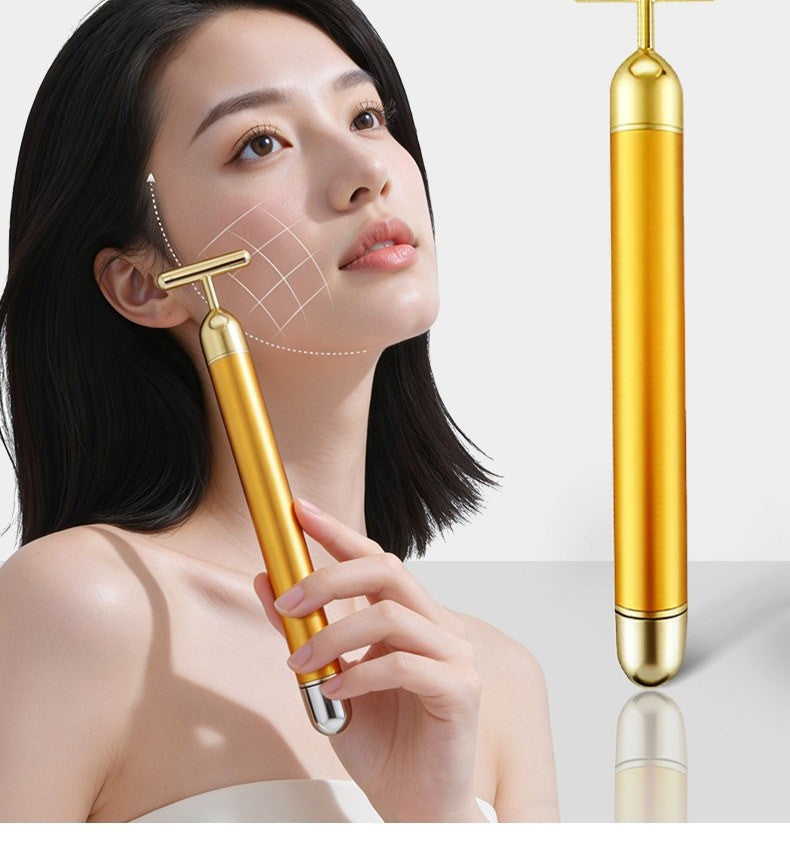 24K gold T-bar face massager by Glow Ritual