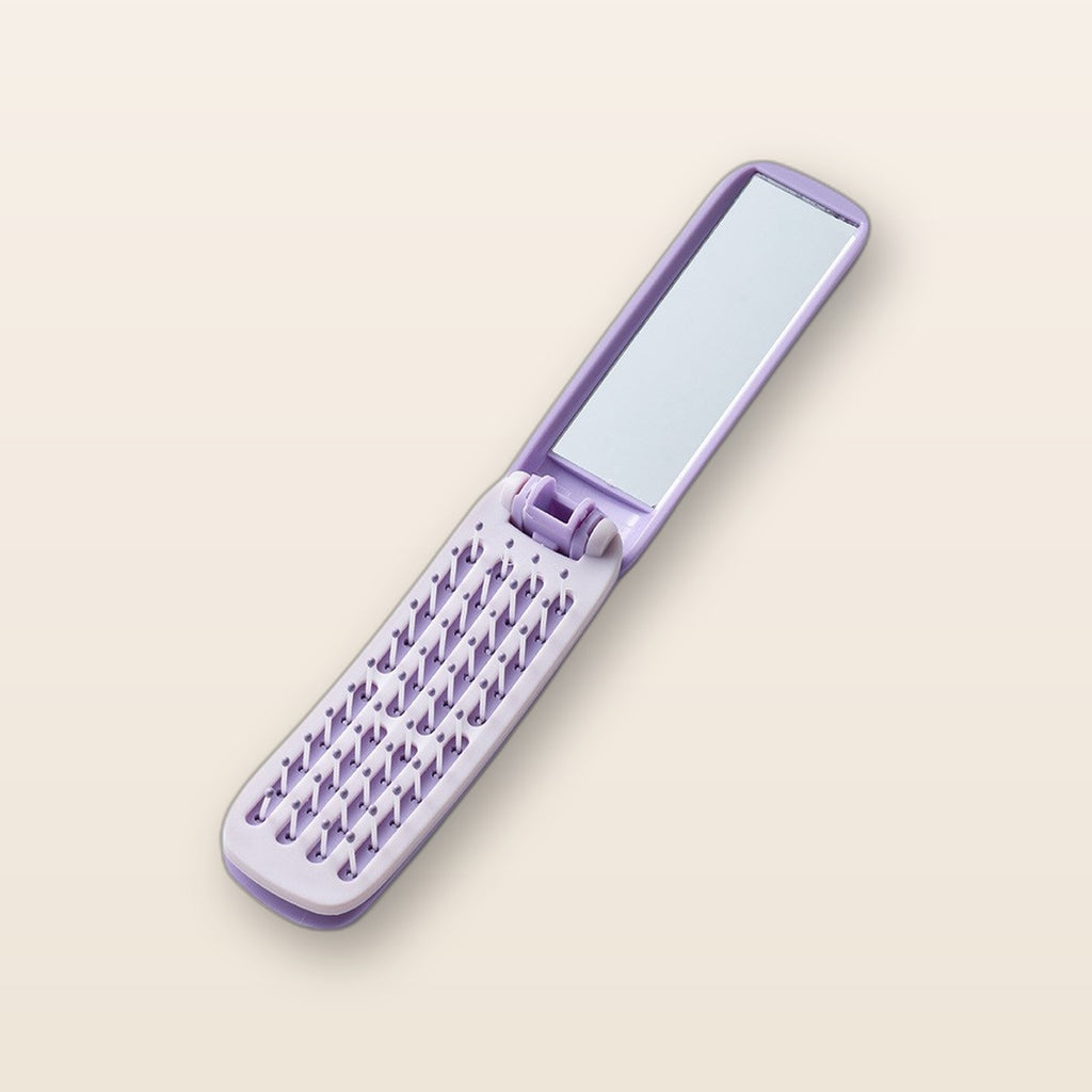 Folding comb with mirror by Glow Ritual