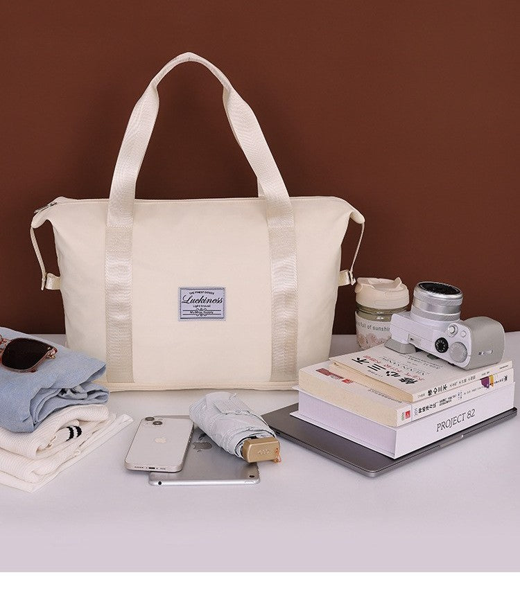 Foldable travel duffel bag by Glow Ritual