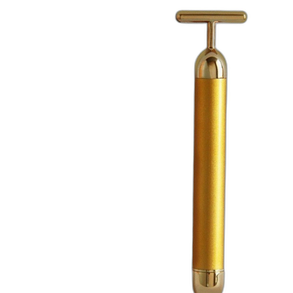 24K gold T-bar face massager by Glow Ritual