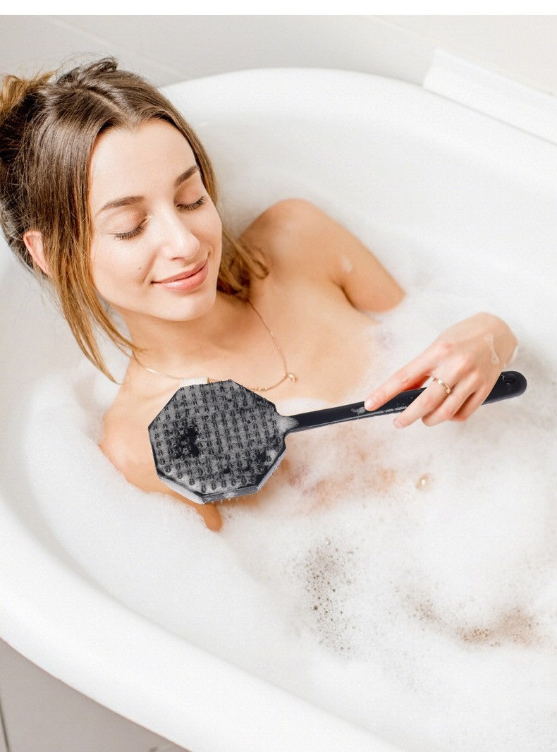 Long-handle silicone body scrubber by Glow Ritual