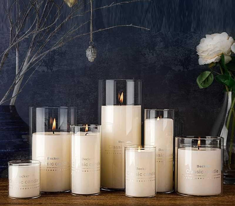 Empty glass candle jars with bamboo lids by Glow Ritual