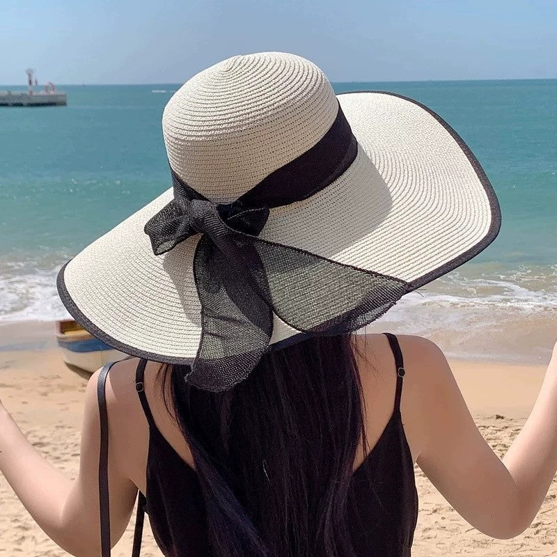 Wide brim straw sun hat by Glow Ritual