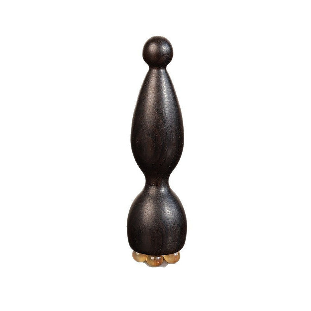 Sandalwood eye massage wand by Glow Ritual