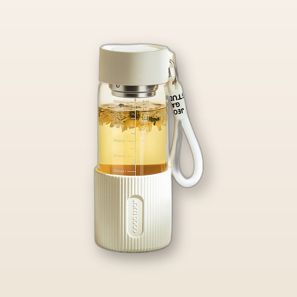 Glass water bottle with silicone sleeve by Glow Ritual