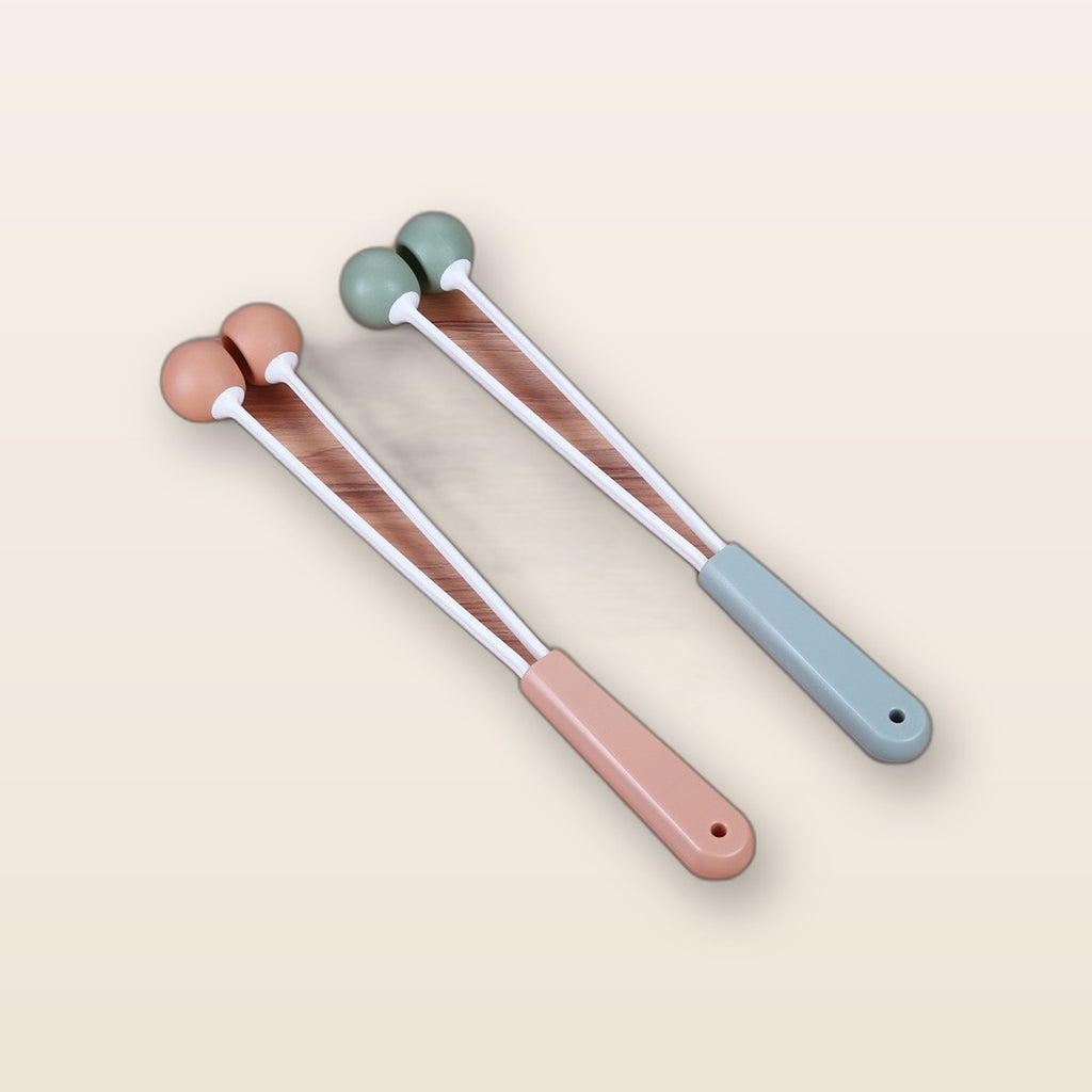 Handheld massage hammer by Glow Ritual