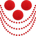 Red felt pom pom garland strands on white background